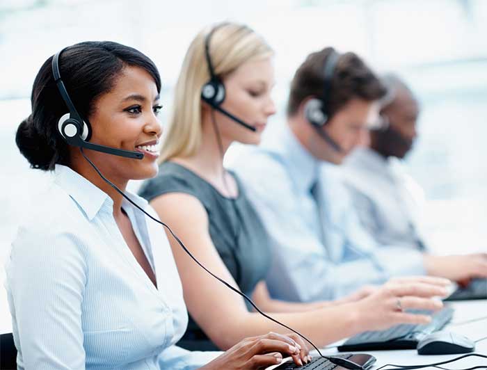 Four telephone support specialists